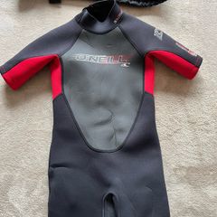 O'Neill child's 2mm shorty wetsuit and buoyancy aid.