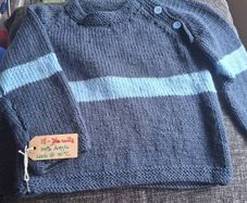 Hand knitted jumpers in county colours