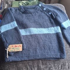 Hand knitted jumpers in county colours