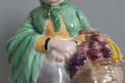 FIGURINE  - Old Lady - Carrying a Basket of Fruit