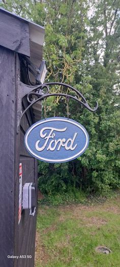 ford hanging  cast iron sign