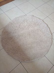 round cream rug