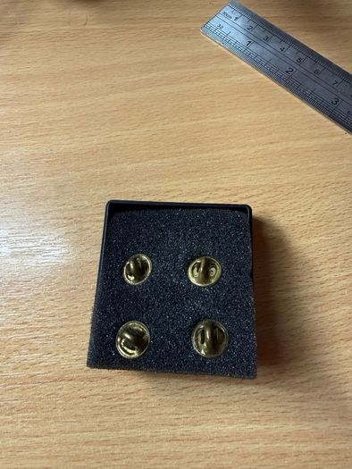 Vintage Irish Defence Forces Artillery Corps collar badges