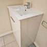 bathroom cabinet and sink Image 3