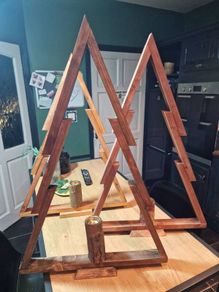 hand made wooden trees with tealight