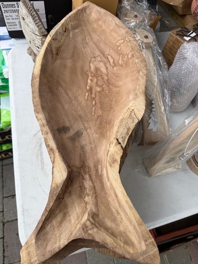 Beautiful hand-carved rustic wooden bowl/platter shaped like a fish. Features stunning natural wood grain patterns and character. Perfect as a unique table centerpiece, fruit bowl, keys tray, or coastal-themed home