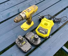 Ryobi drill, batteries and charger.