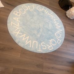 Blue alphabet rug