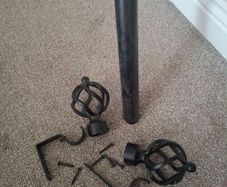 Black metal extendable curtain pole