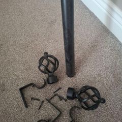 Black metal extendable curtain pole