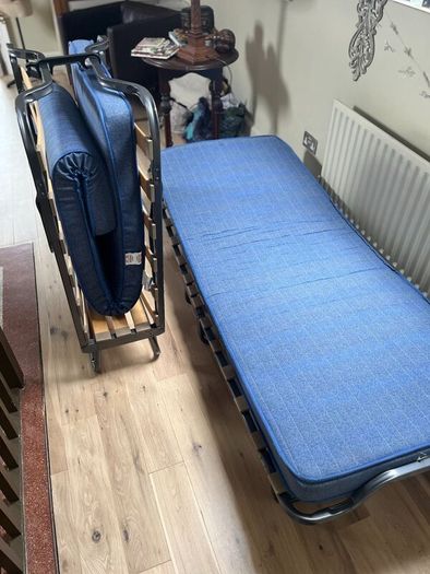 2 x fold-up single beds