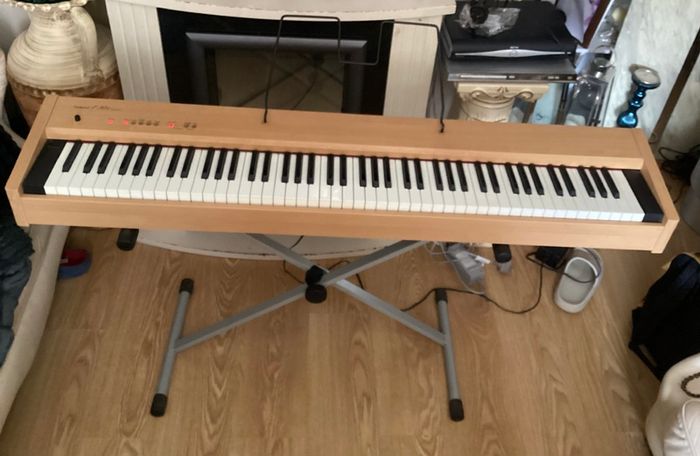 Roland F30e Digital piano and Roland DP - 10 Damper Foot Pedal in Excellent Condition.  (Barely used)