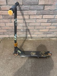 Black two wheeled scooter
