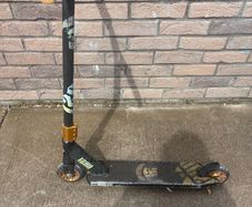 Black two wheeled scooter