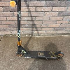 Black two wheeled scooter