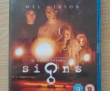 SIGNS Blu Ray.  Mel Gibson