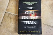 The Girl On the Train by Paula Hawkins.