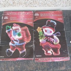 Christmas magic snowman and Santa lights