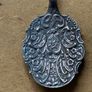 Antique detailed Repousse silver-plated jam spoon Image 3