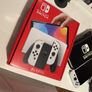 Nintendo Switch OLED with box and unused accessories with case Image 2