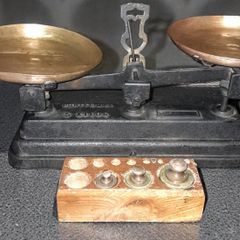 Antique cast iron and brass 5kg scales with 3 weights