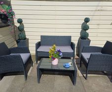 Garden Rattan set. 2 Seater Sofa, 2 Armchairs, 2 Planters, Coffee Table.table
