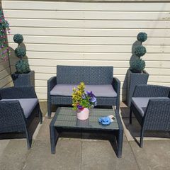 Garden Rattan set. 2 Seater Sofa, 2 Armchairs, 2 Planters, Coffee Table.table