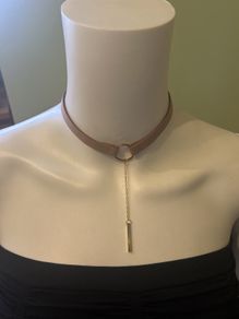 Beige and gold tone necklace
