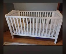 Nested cot bed