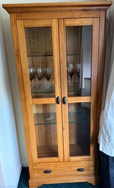 Solid oak display cabinet with glass shelves