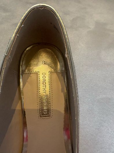 Gold glitter peep-toe heels.