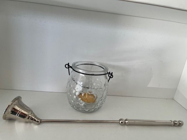 Metal Handle Candle Snuffer. Silver Finish. Moveable Head. With Hanging Tea Light. In Excellent Condition.