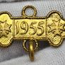 Some sort of gold color medal 1955 Image 3