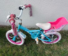 Girls bike with doll carier