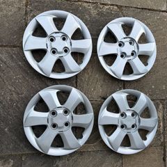 Four Plastic Silver Hub Caps