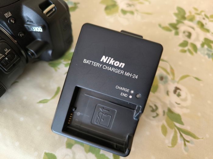 Nikon D3100 + Nikon 50mm f/1.8G AF-S Nikkor
