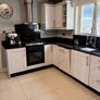 Whole Kitchen, including cabinets, granite countertops, appliances, oven hood, sink and tap Image 4