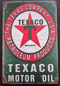Texaco oil company , vintage style metal sign .