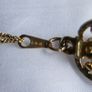 Gold Plated Necklace with Purple Stone. Stone is Multifaceted & Sparkles in the Light. Image 10