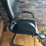 Medium back manager armchair, chrome cantilever frame and fixed padded arms. Black leather Image 2