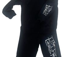 DIY Iron on vinyl transfer. ( tracksuit not included )