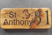 sign, shed, golf, house number, sign, house number, St Anthony plaque