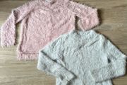 2 girls fluffy sweaters 8-10y