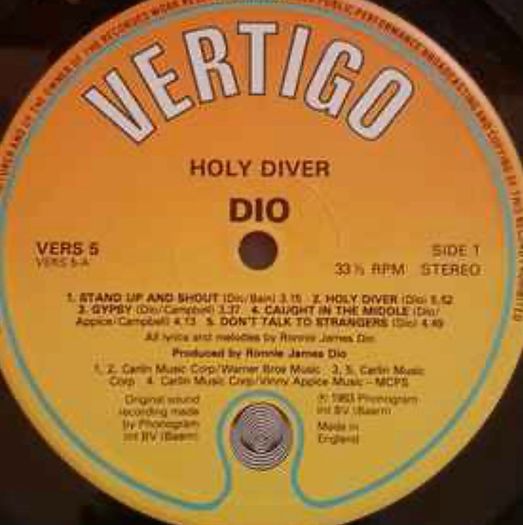 DIO Holy Diver original 1983 release with original inner lyric sheet vinyl record in near mint condition