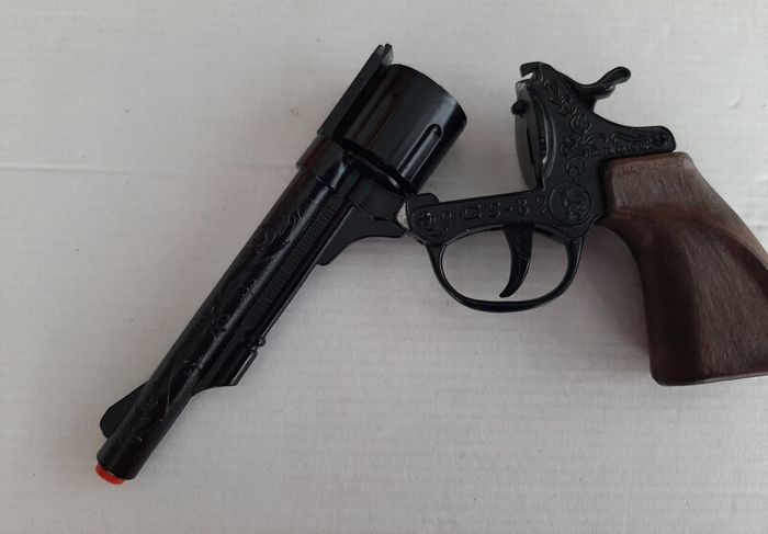 vintage new toy gun in box and holster
