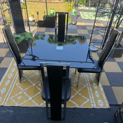 Black Glass and chrome dining table and chairs