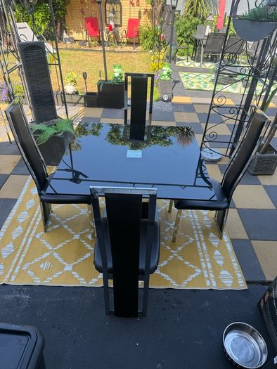 Black Glass and chrome dining table and chairs
