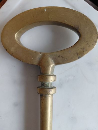 Antique solid brass ornamental key 35cm in length