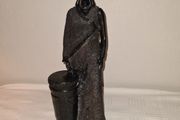 African woman with drum statue