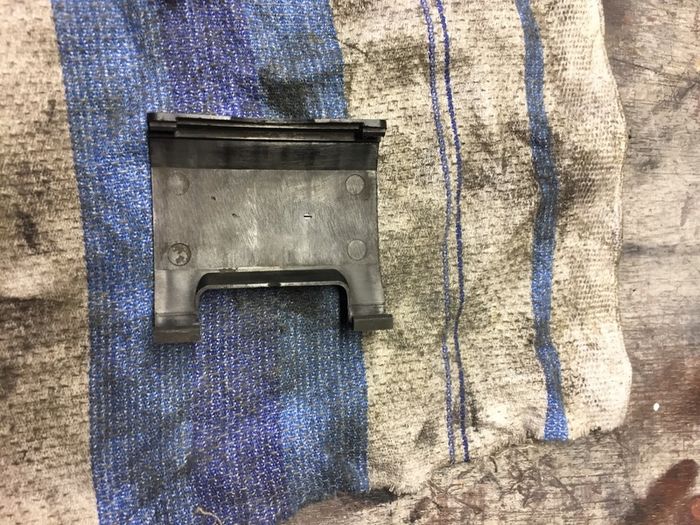 Rear brake caliper dust cover